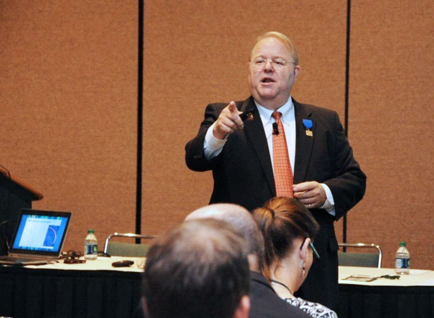 Dave Hewett speaking to a seminar audience